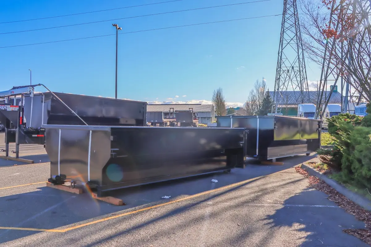 Roll-off dumpster ready for waste disposal at job site for 15 Yard Dumpster Rental in Horseshoe Bay